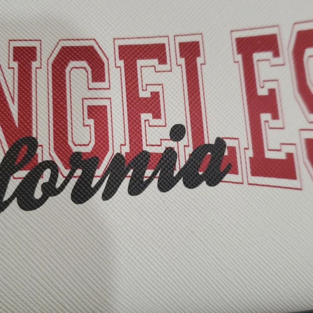 Los‎ Angeles California white coated canvas zip around red trim wallet brand new